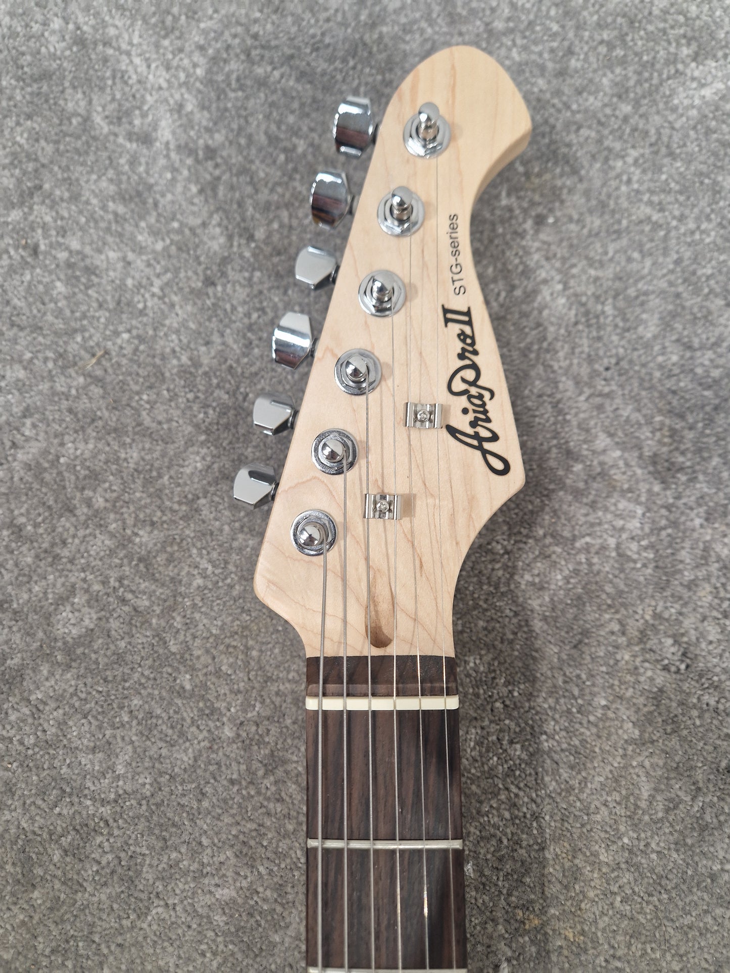 Aria Pro II STG-004 Electric Guitar – SSH Pickup Layout & Maple Neck – Mint