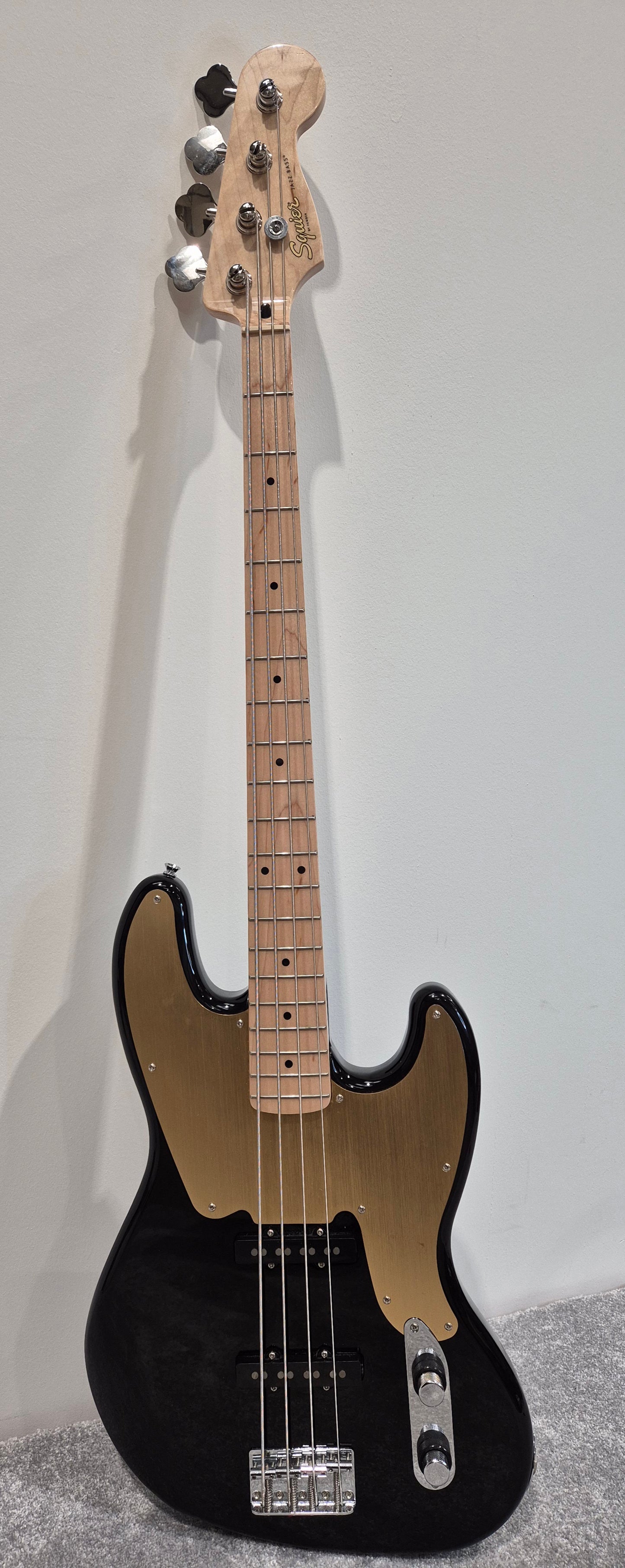 Squier Paranormal Series 54 Jazz Bass - Black and Gold w/ Soft Gig Bag