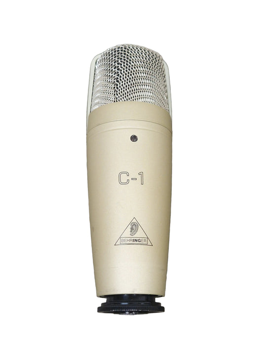 Condenser microphone on a gray surface