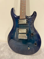 Vintage VRS 100 Trans Blue Electric Guitar - Fusion Carry Case - Tremelo Bar - Image 1