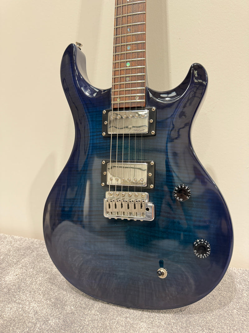 Vintage VRS 100 Trans Blue Electric Guitar - Fusion Carry Case - Tremelo Bar - Image 1